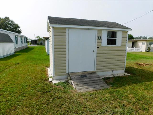 Detached storage shed is used as workshop.