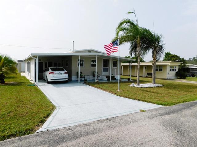 Painted driveway, vinyl siding, updated windows, central air conditioning, in this well-maintained home.