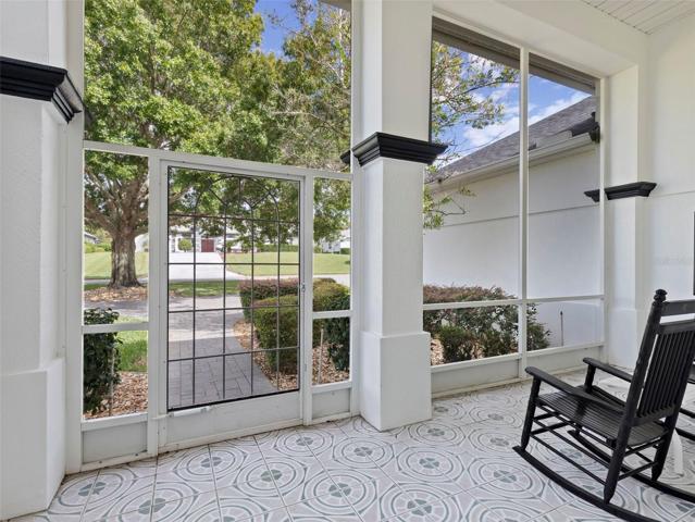 Screen-enclosed front porch