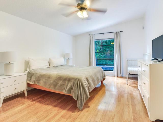 Main bedroom with wooden flooring
