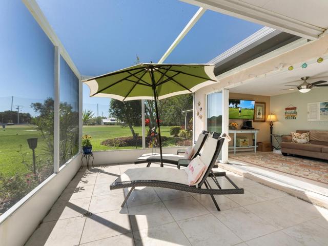 Outdoor sitting area on the screen porch