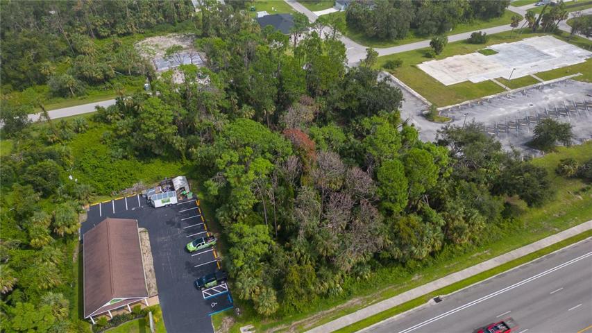 Left side of the lots that front on U.S. 41 (Tamiami Trail) and Tanglewood Ave.