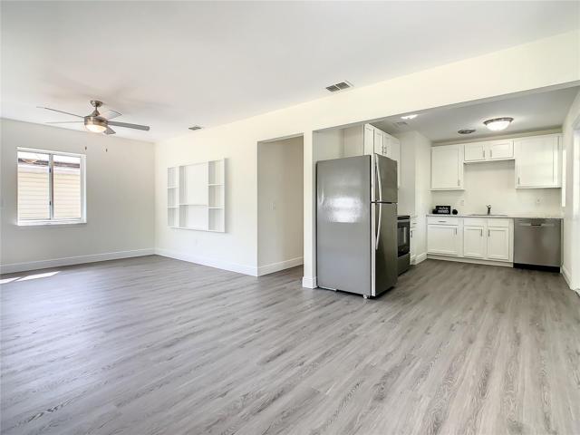 Living room, dining room and kitchen.