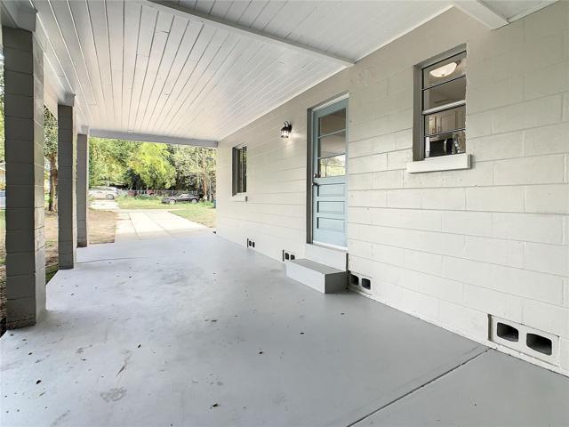 Carport with walk door into the kitchen