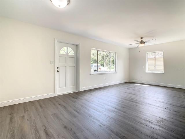 Living room area looking at the front door.