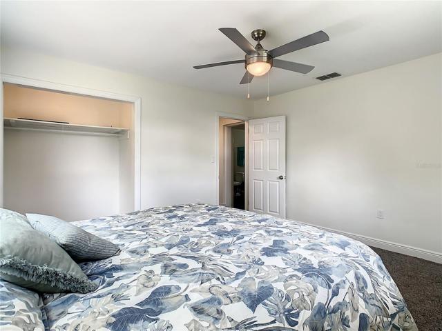 Nice sized closet in the master bedroom plus new ceiling fan and light fixture.