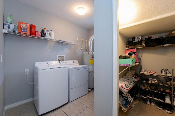 Laundry on the first floor  showing storage.
