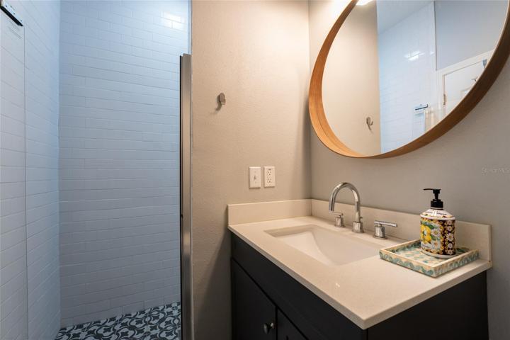 Full Bathroom on the first floor with shower enclosure.
