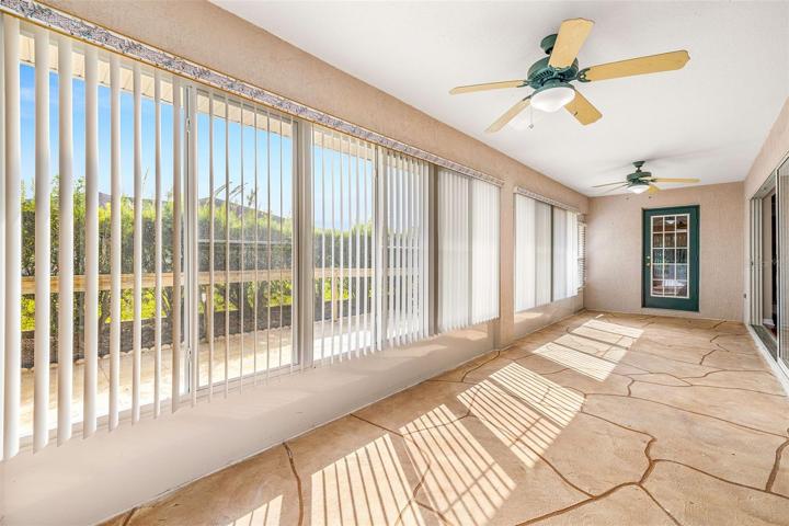 DECORATIVE CONCRETE FLOORING, CEILING FANS, PLENTY OF WINDOWS AND NATURAL LIGHT!