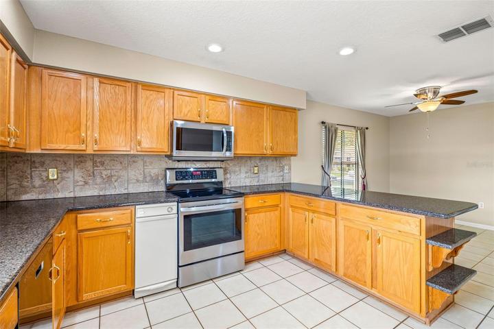 KITCHEN OVER LOOKS FORMAL DINING ROOM!