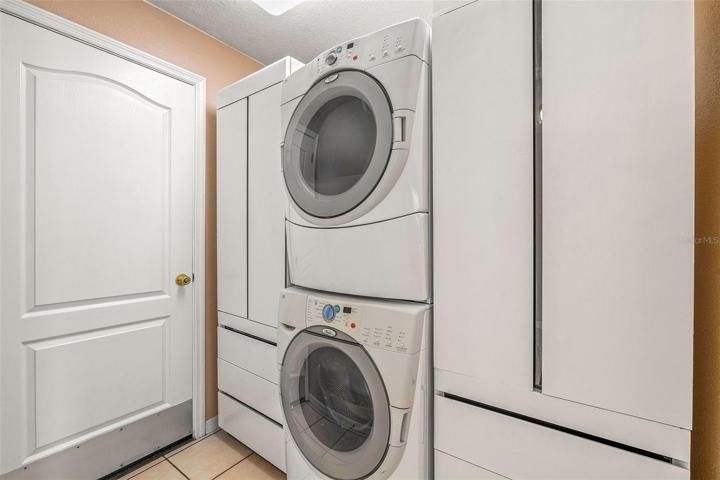 INDOOR LAUNDRY ROOM, WITH GREAT STORAGE, WASHER/DRYER CONVEY.