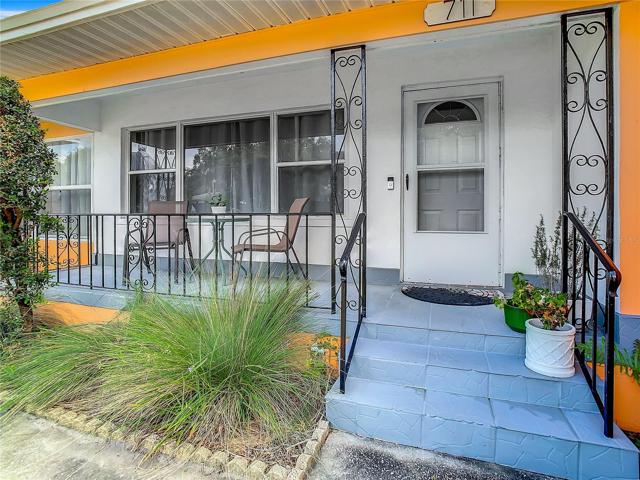 large front yard, long driveway, and front porch to sit and enjoy your morning coffee