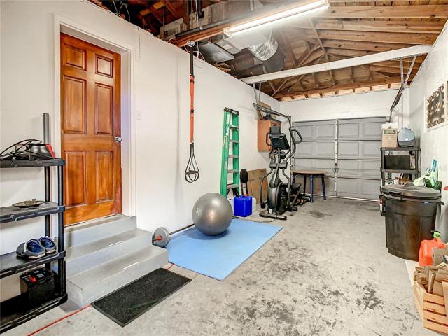 The garage entry door is also in the family room. Follow through the garage to the large utility room which also has a half bathroom and is plumbed for a shower.