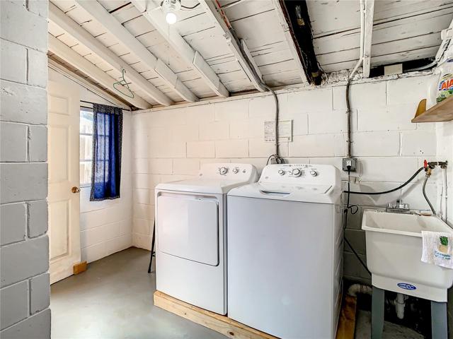 The garage entry door is also in the family room. Follow through the garage to the large utility room which also has a half bathroom and is plumbed for a shower.