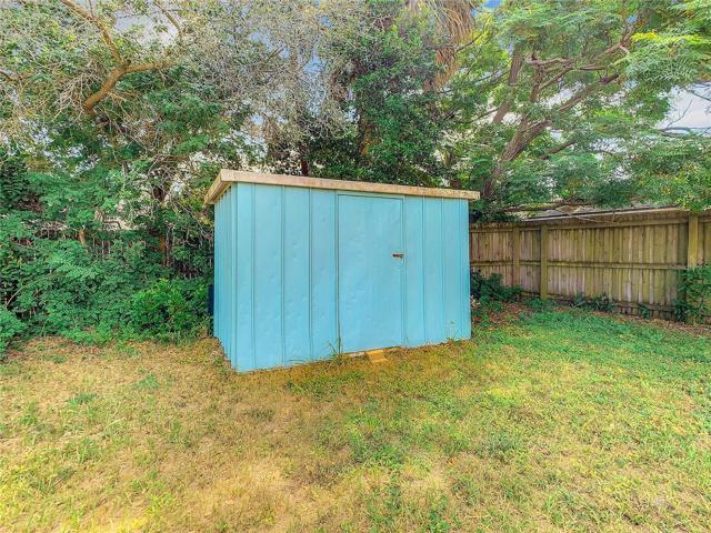 The Large Fully fenced-in back yard offers plenty of green space and a storage shed. Keep the dirt outside or wash dogs with the unique shower set up in the back yard too.