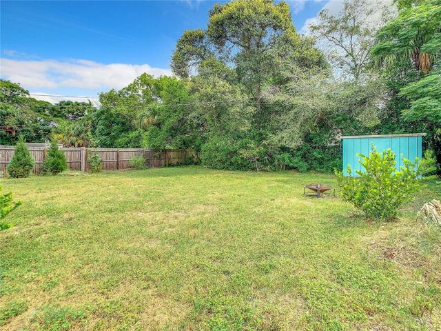 The Large Fully fenced-in back yard offers plenty of green space and a storage shed. Keep the dirt outside or wash dogs with the unique shower set up in the back yard too.