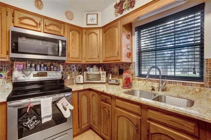 Kitchen has granite countertops