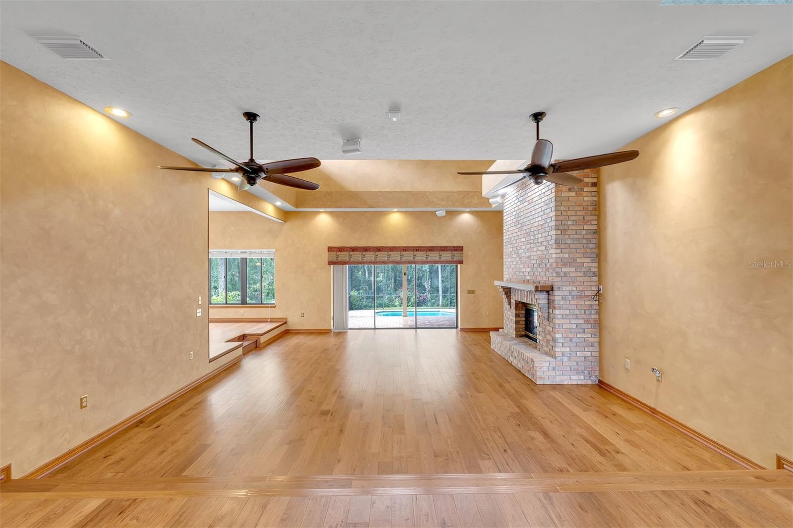 Massive sunken living room with amazing views of the back yard