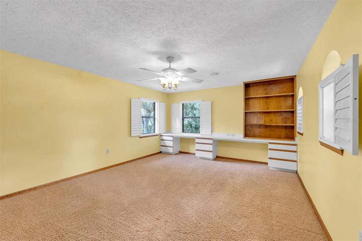Oversized bedroom 2 with walk-in access to the attic