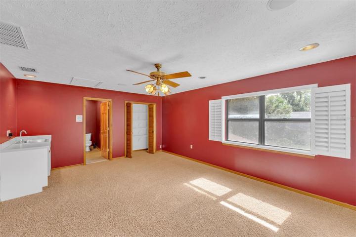Bonus room/4th bedroom with access to the 3rd full bath and a private deck