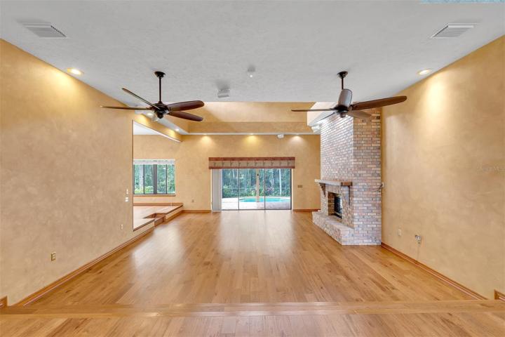 Massive sunken living room with amazing views of the back yard