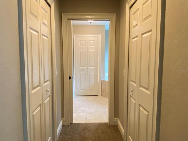View of master bedroom closet and ensuite from master bedroom