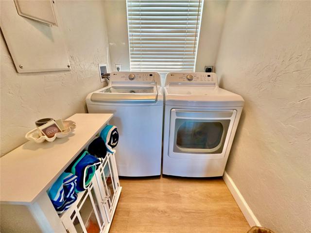 Indoor Laundry room with new Washer and Dryer!