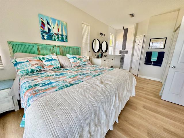 Large enough for a King size bed and with an En-Suite bathroom with walk-in shower, double sink vanity and water closet.