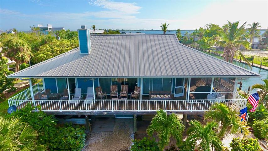 Open air deck along west side of home.