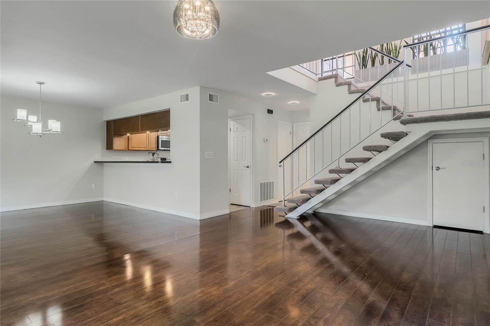 Open floor concept. kitchen, dining and living room area combo.