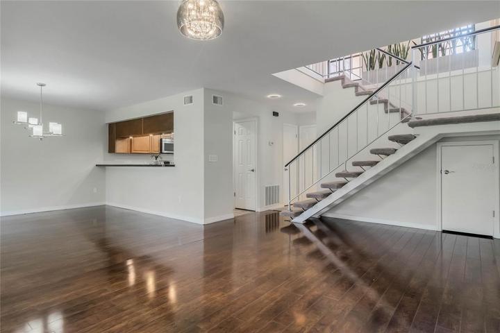 Open floor concept. kitchen, dining and living room area combo.