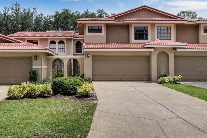 New Spanish style tile roof was recently installed and painted with a lighter modern color