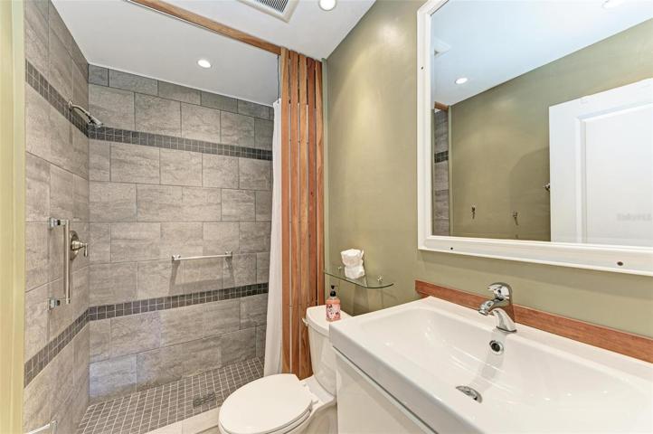 Guest Bathroom has beautiful walk-in shower