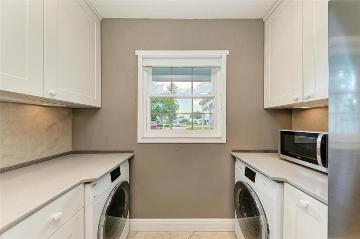 Washer & Dryer and kitchen window!