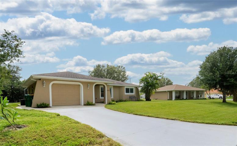 Large Corner Lot with Separate 4-Car, Pull through Garage