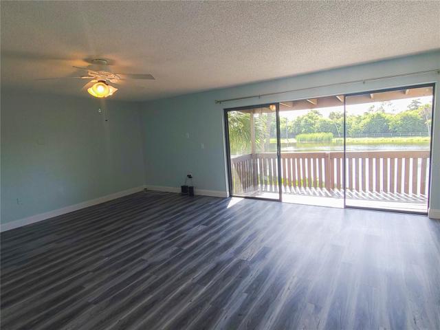 Living room with expansive sliding doors to lake view