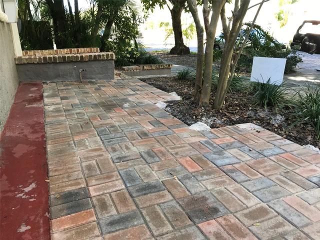 Bricked patio, table and chars included
