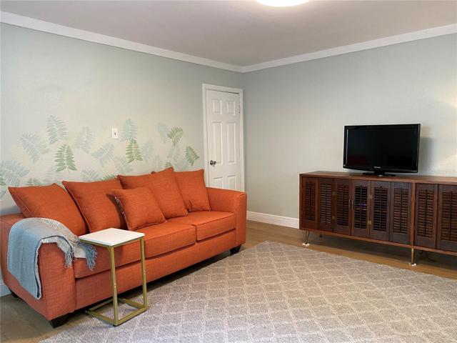 Living room, bedroom door shown