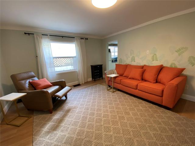 Living room, kitchen to left