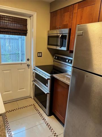 A small chefs kitchen with double oven