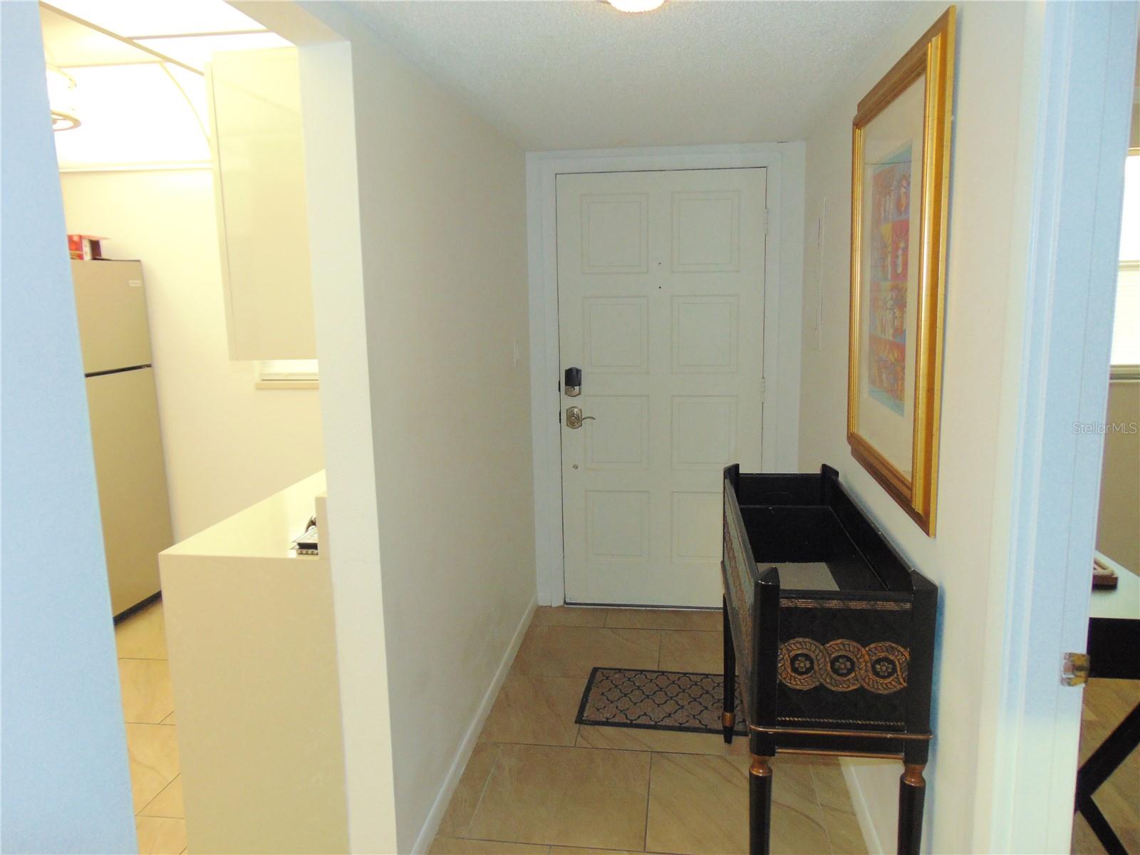 Front foyer, entry door.