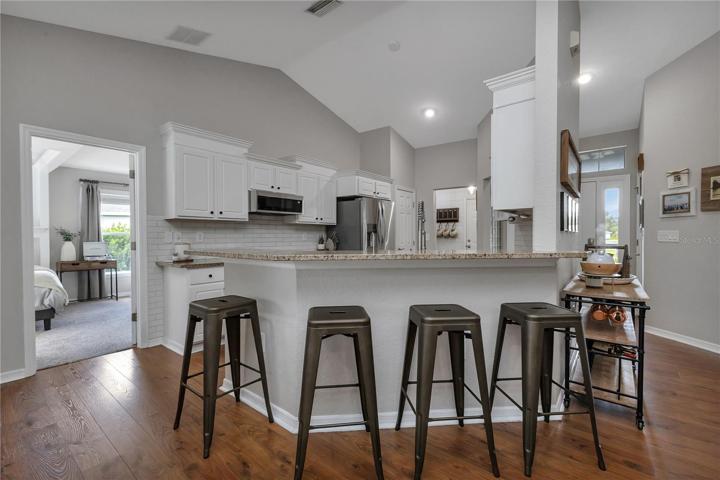 Open-concept kitchen and bar