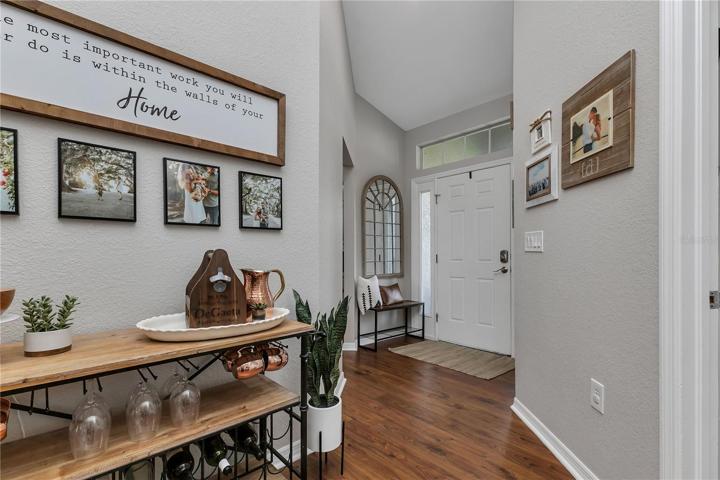 Foyer with storage closet next to front door