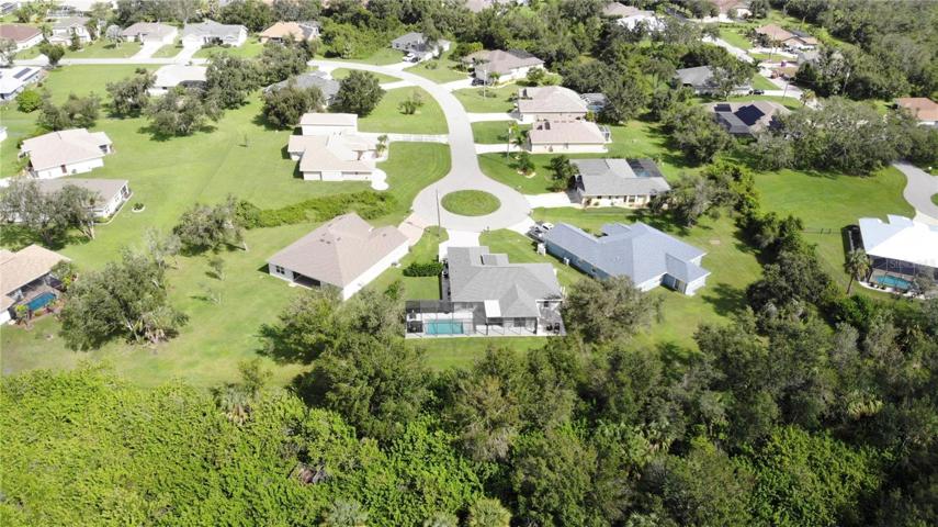 Protected by permanently wooded back yard