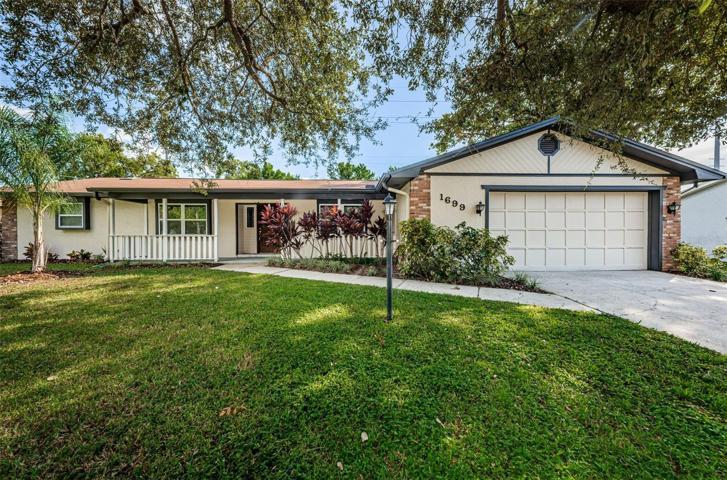 Great Location on the Dunedin line and Dunedin schools. 3/2/2 Furnished Pool Home 2,517 sq. ft on a private lot over 1/4 acre of land. Bike to Clearwater Beach or Honeymoon Island, walk or bike to Edgewater Park, Pinellas Trail, Downtown Dunedin with shoppes, restaurants, events and marina. No HOA or flood insurance.