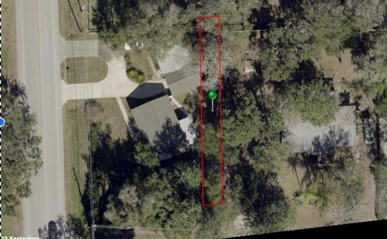 Parcel#701102000101included to expand the property by 15 feet along E Side