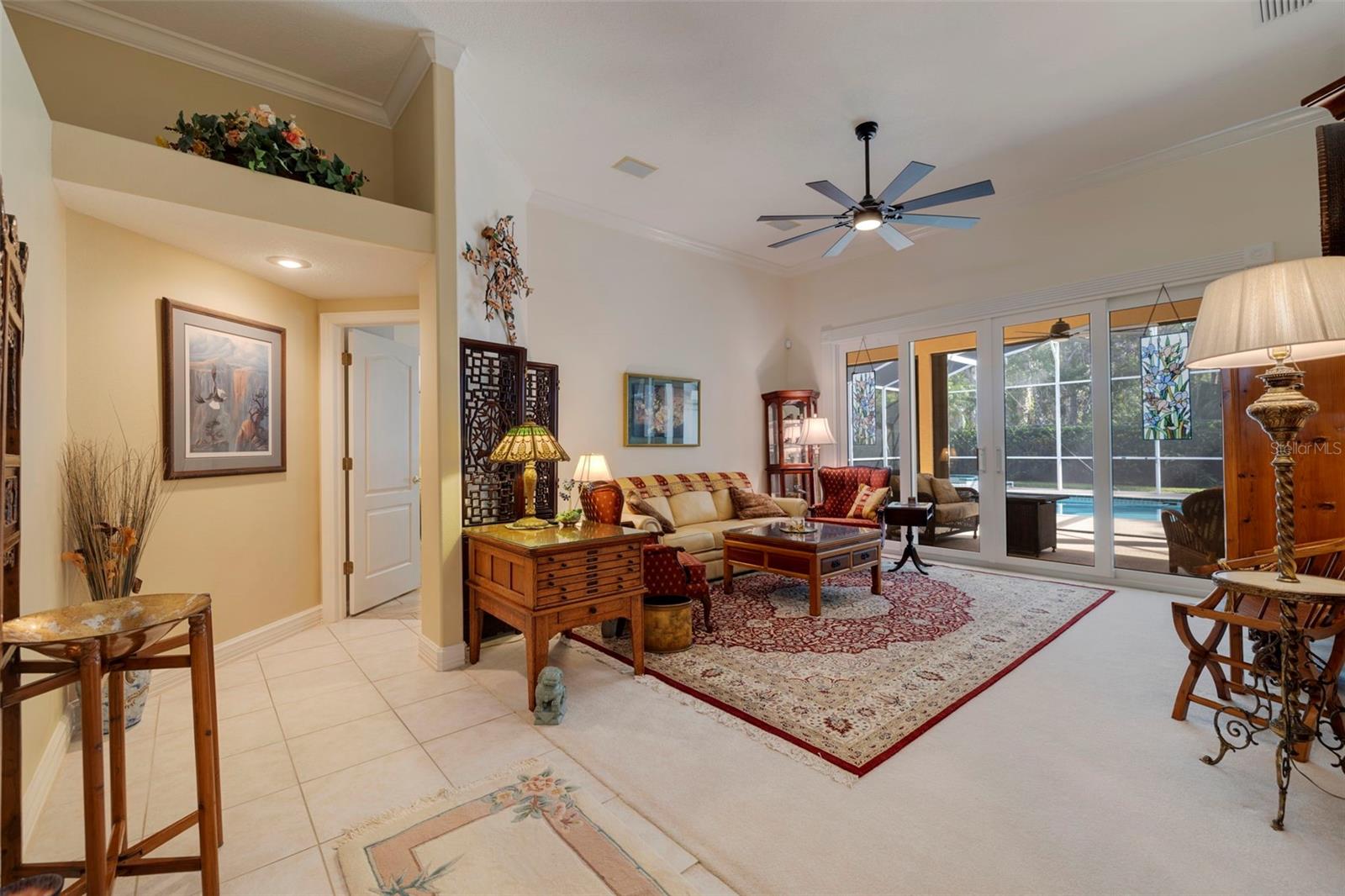 Living room  Pool access with  Master Bedroom Entrance