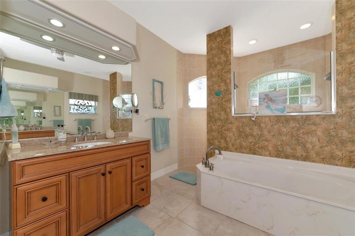 Master Bath with His and her sinks opposite each other.