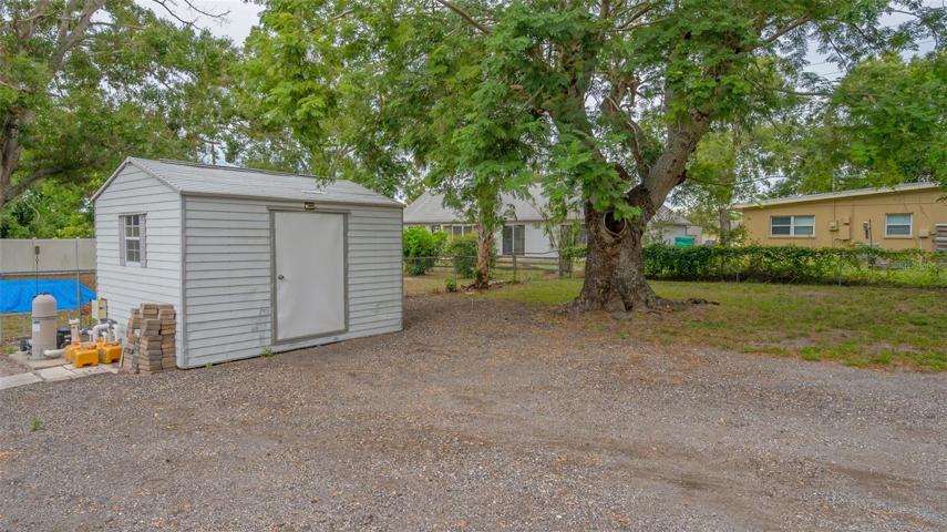 Metal 12 x 12 shed conveys with the property