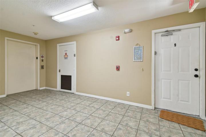 Elevator and entrance to condo